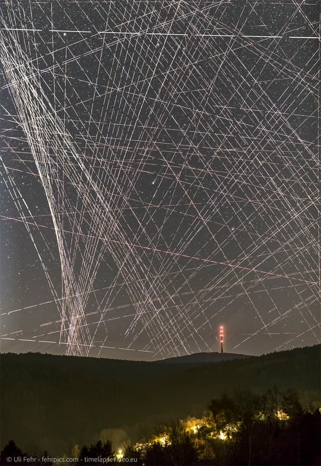 Comet R3 PanSTARRS Behind Satellite Trails