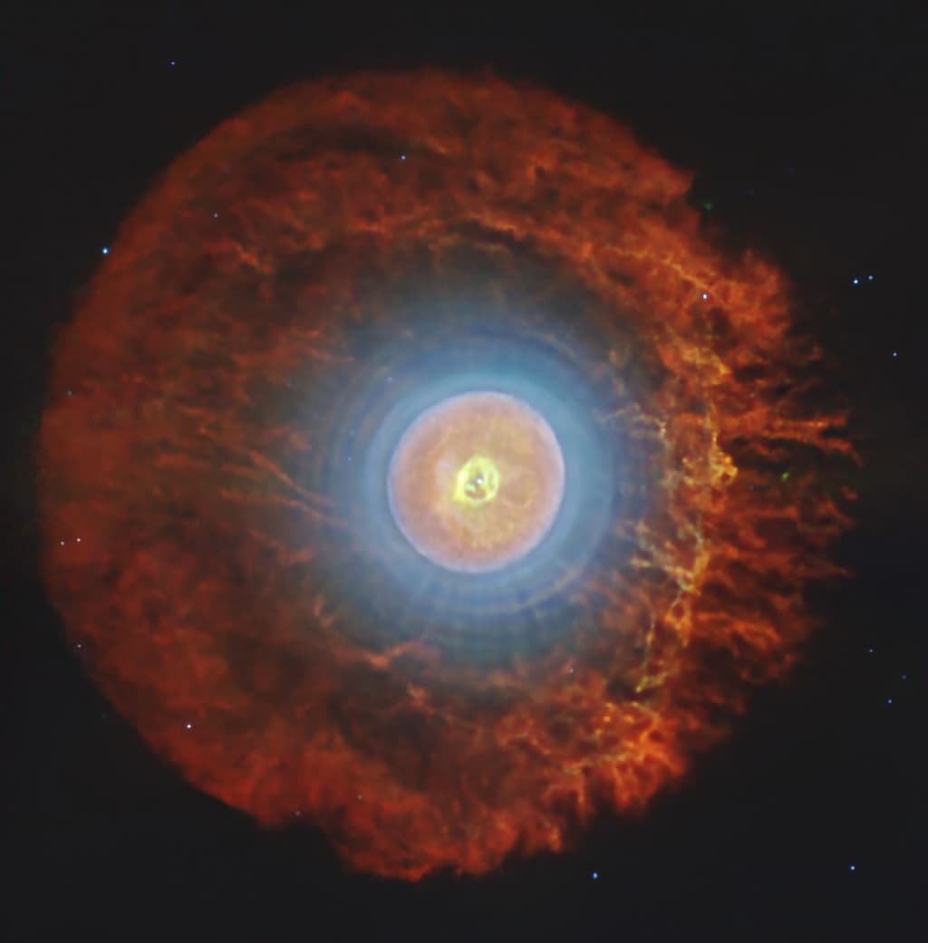 A Planetary Nebula with Cosmic Buckyballs
