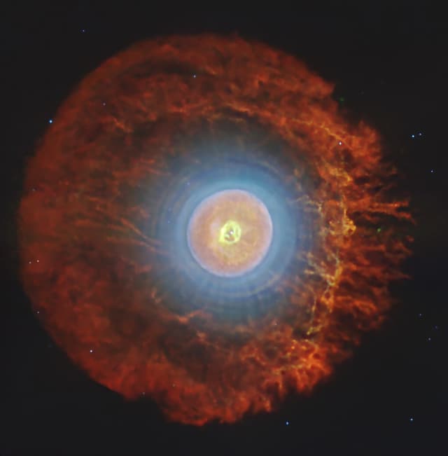 A Planetary Nebula with Cosmic Buckyballs
